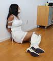 MILF in white tied to the floor